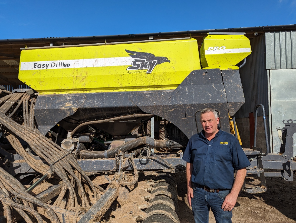 Daniel Harding of Alvis Contracting, stood in front of his Sky Agriculture EasyDrill
