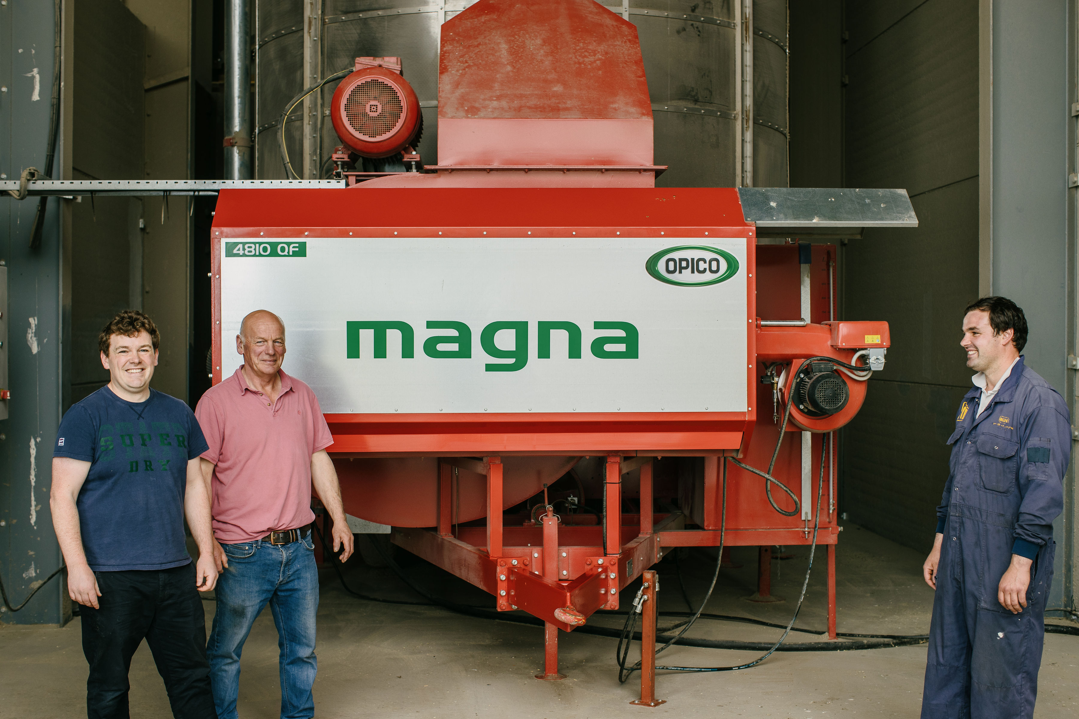 Will, Andrew and James Clarke stood with their OPICO diesel Grain Dryer